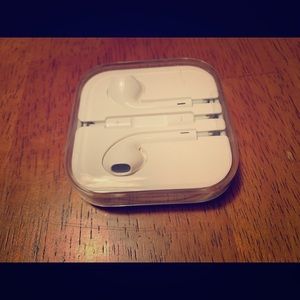 Brand new , unopened , Apple earphones